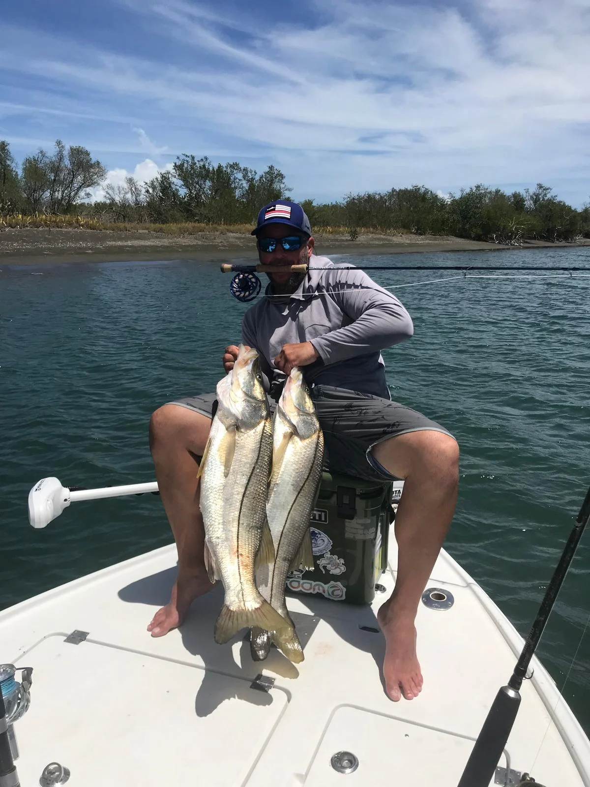 Double hookup — two tarpon boated at once